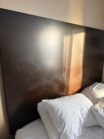 Gross headboard with fingerprints all over it