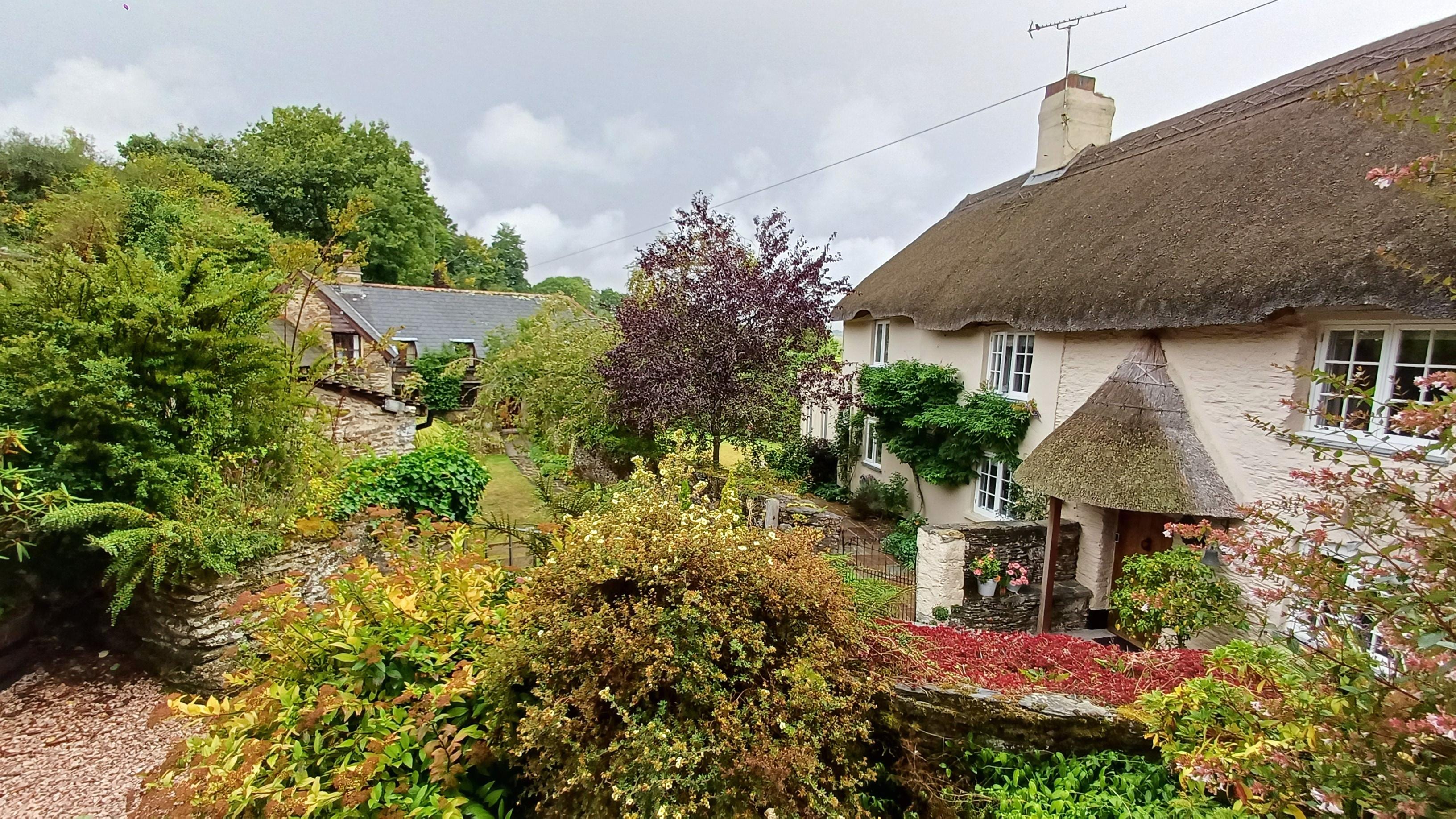 Mannings Farm, Cottage im Hintergrund