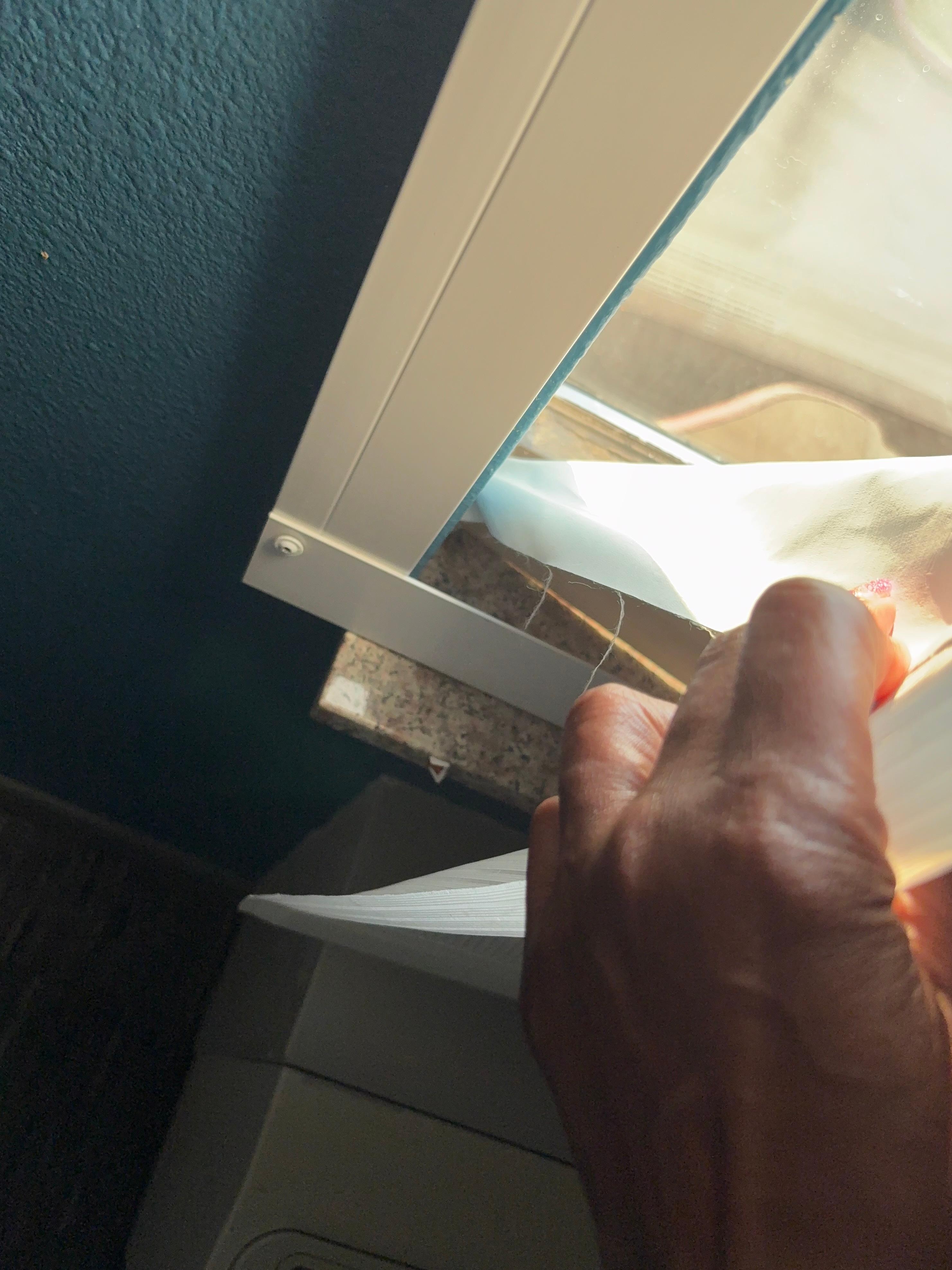 Window shade glued shut