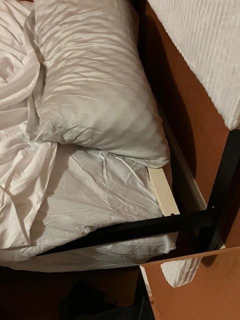 bed mattress falling off supporting structure other bed at head