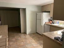 The kitchen. Dishwasher, fridge, stove, all utensils we needed.