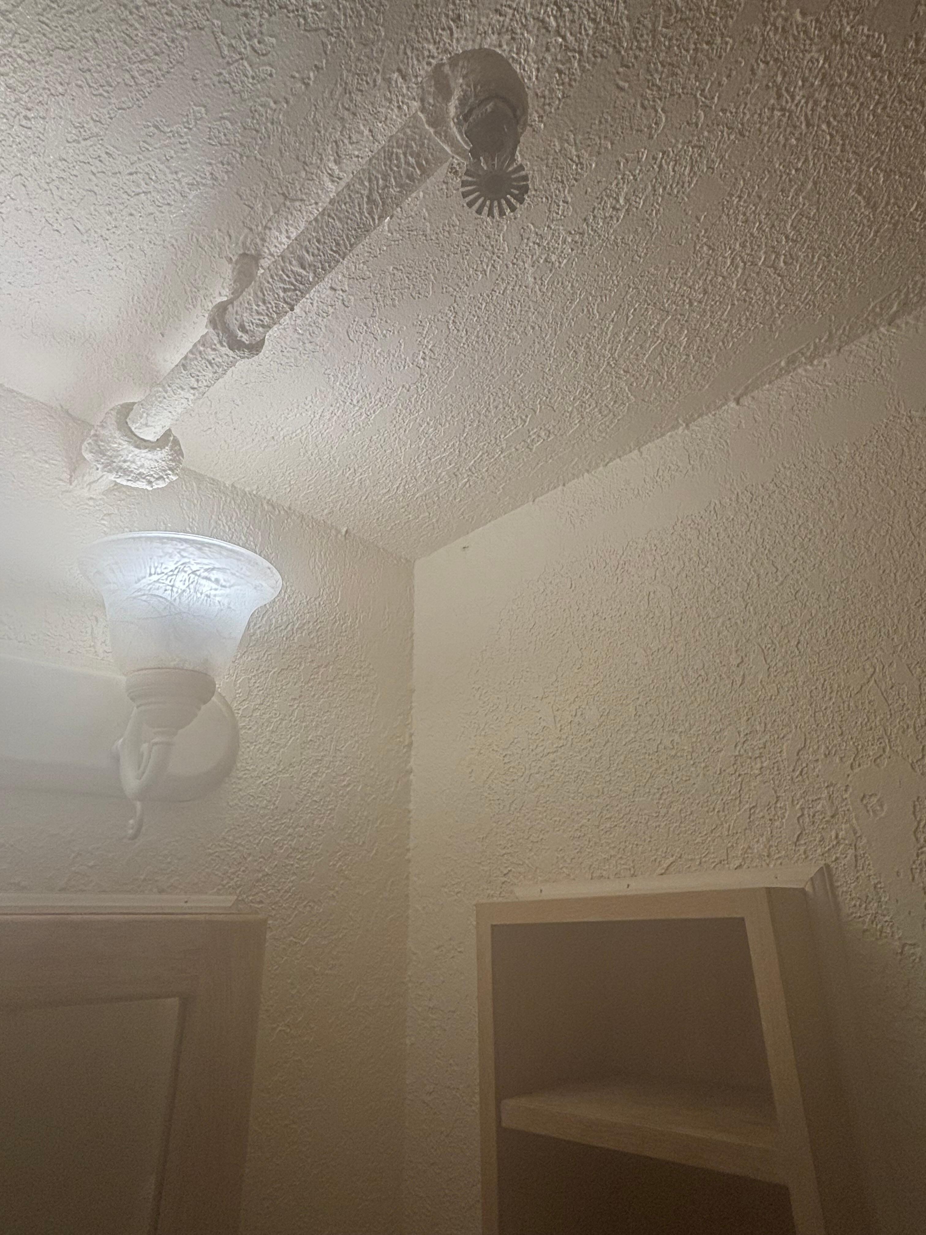 Spider webs, cracks down walls/paint. 