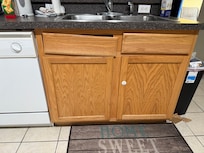 All countertop drawer slats were removed and then attempted to be replaced causing gaping holes
