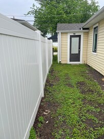 Left side of the “enclosed yard”