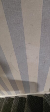 Pen marks on wall