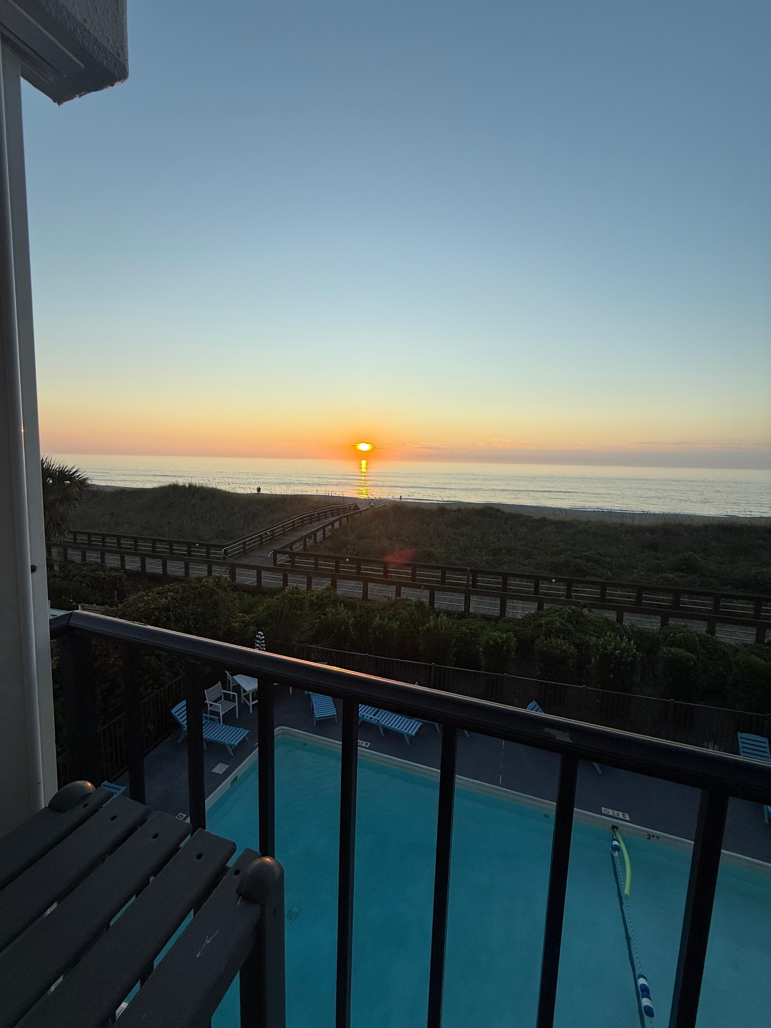 Unit overlooks beach & pool