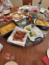 The giant lazy susan on the table was put to good use.