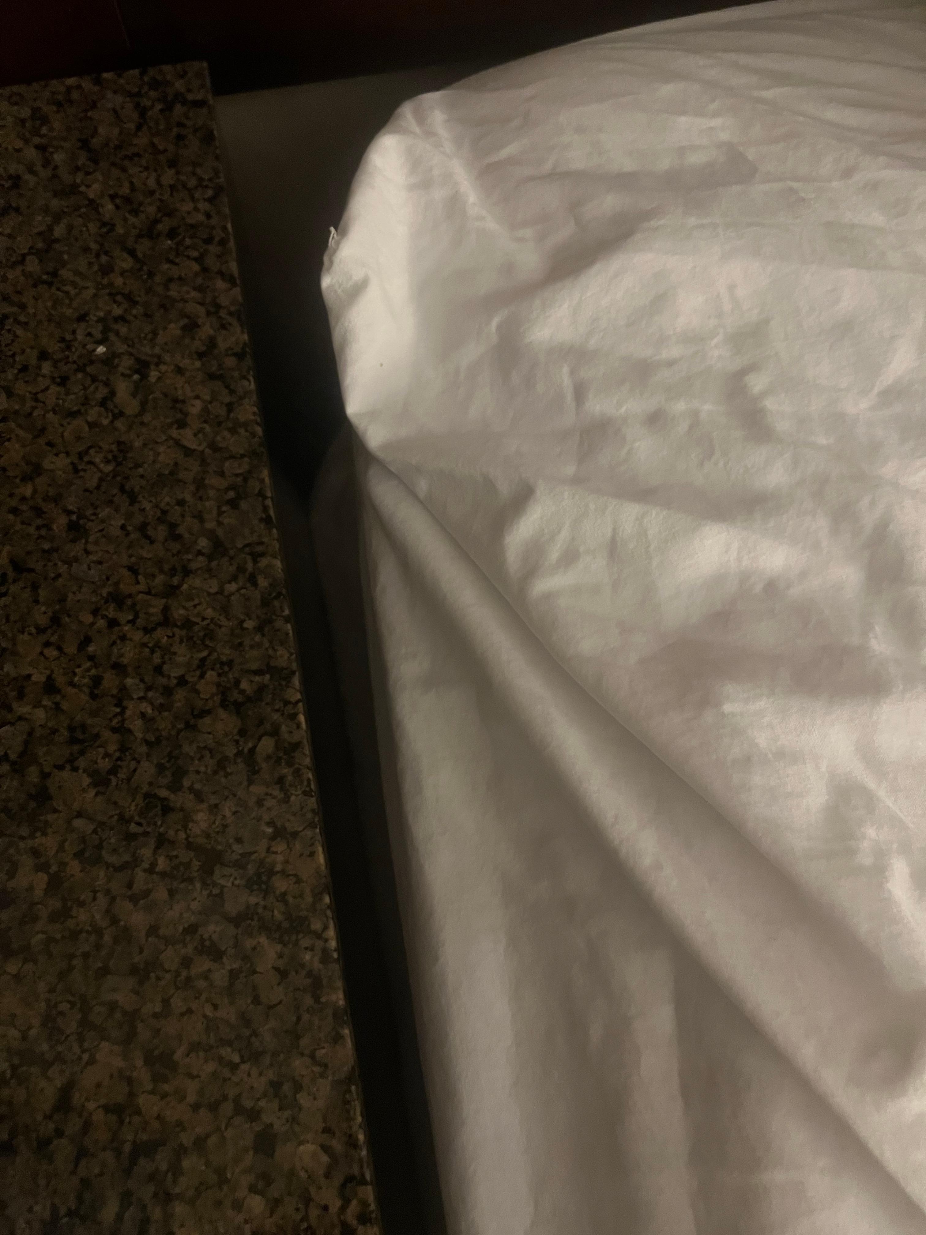 Sheet not pulled down to cover matttess 