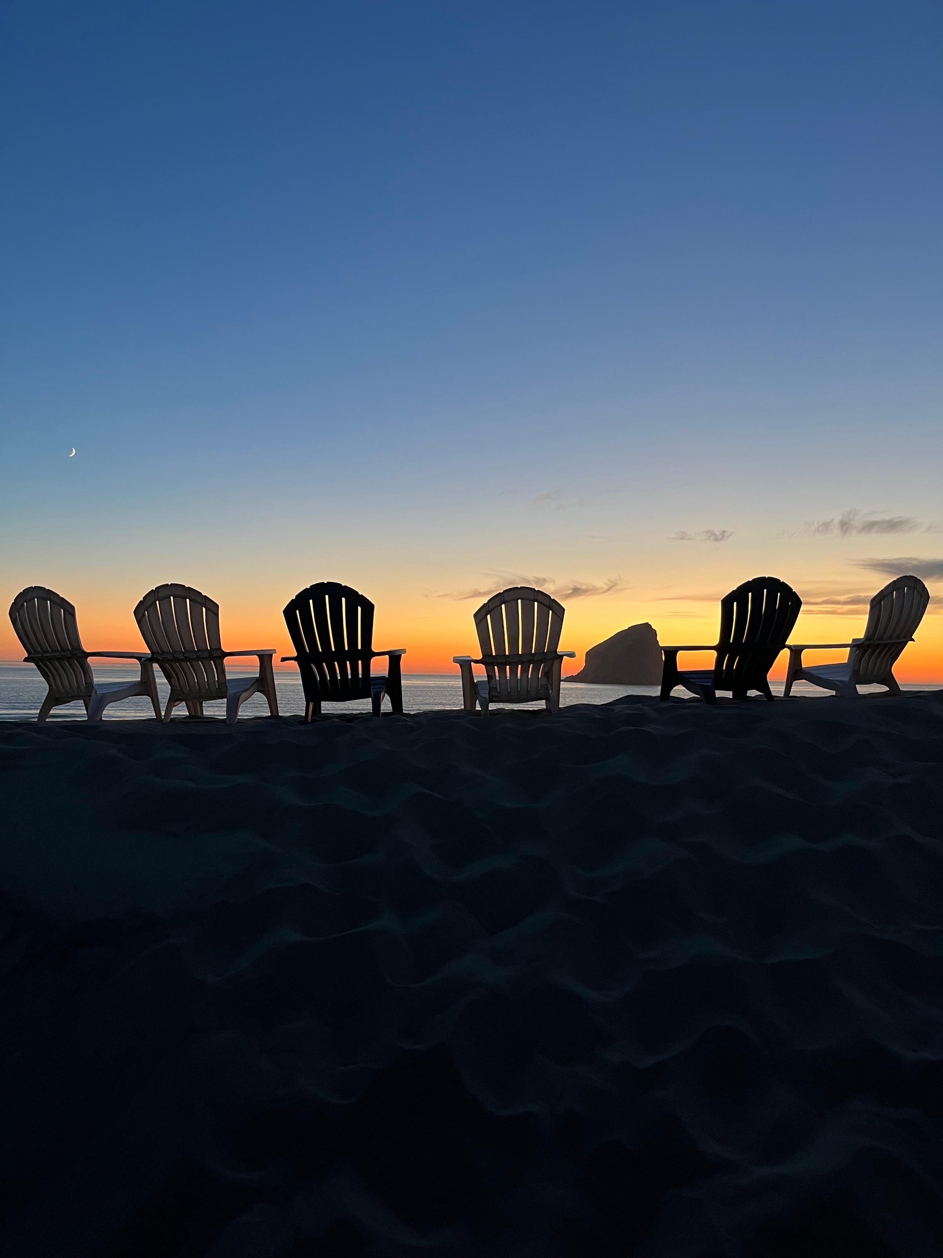 Chairs at the top of the sand dune 