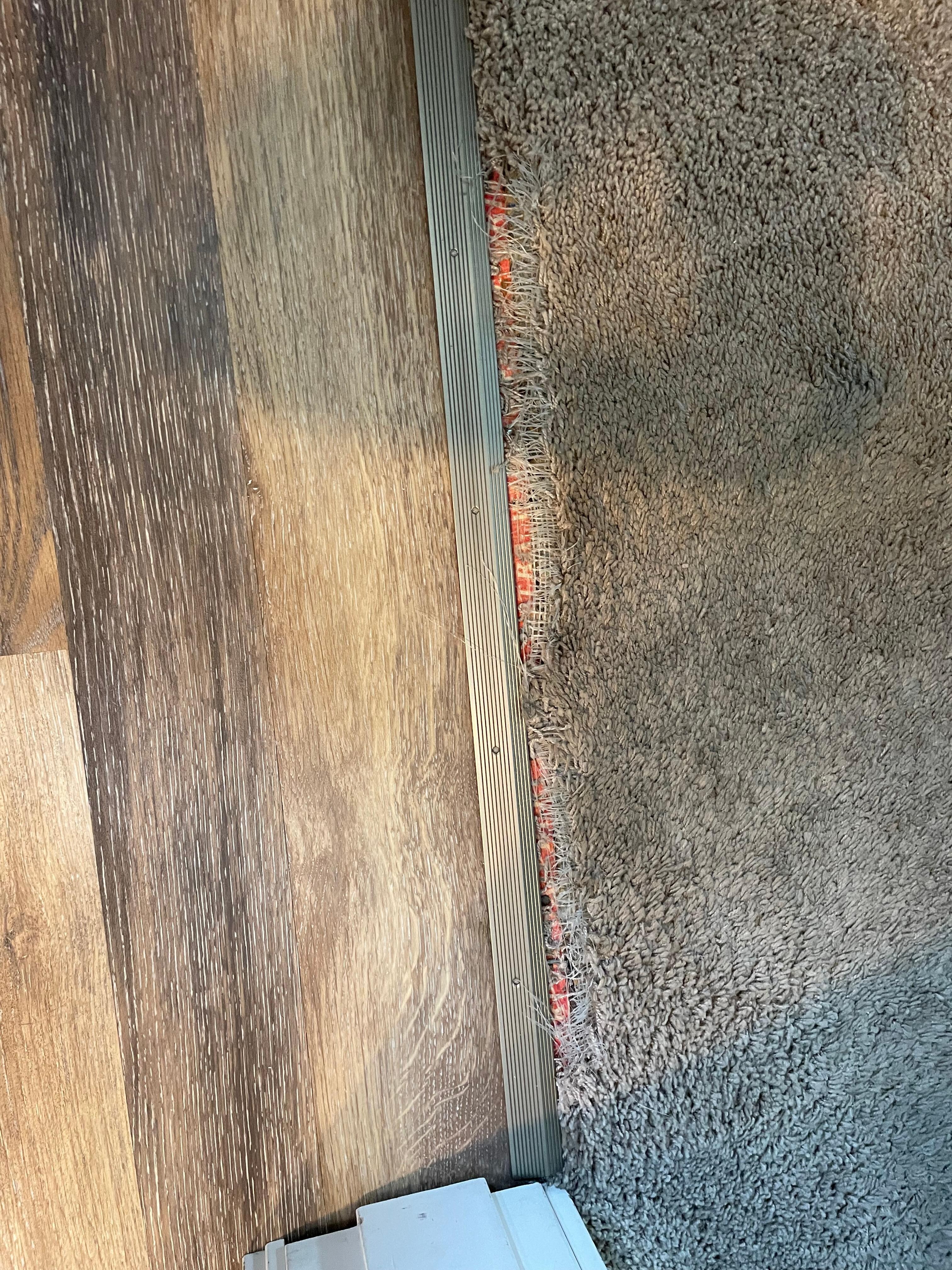 Bedroom carpet pulling from tack strip