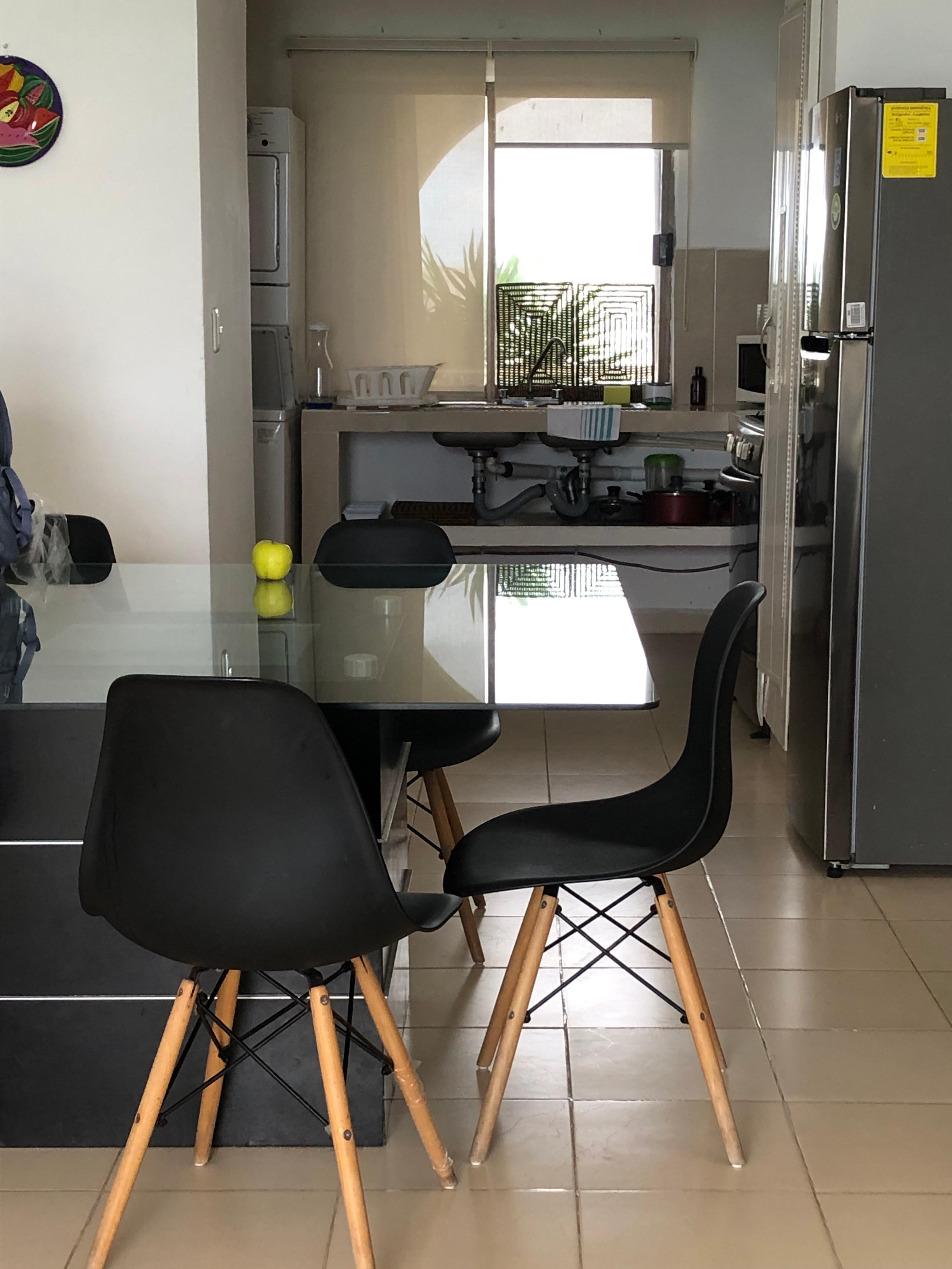 Kitchen view overlook’s entrance hallway & top of hospital in Kukulkan Plaza. 