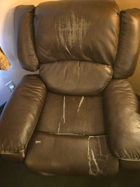 I've seen furniture for curbside giveaway that were in better condition than this chair in the room.