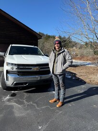 My son in law and his new truck at the cabin