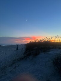 Sunset on the beach out front of the condo.