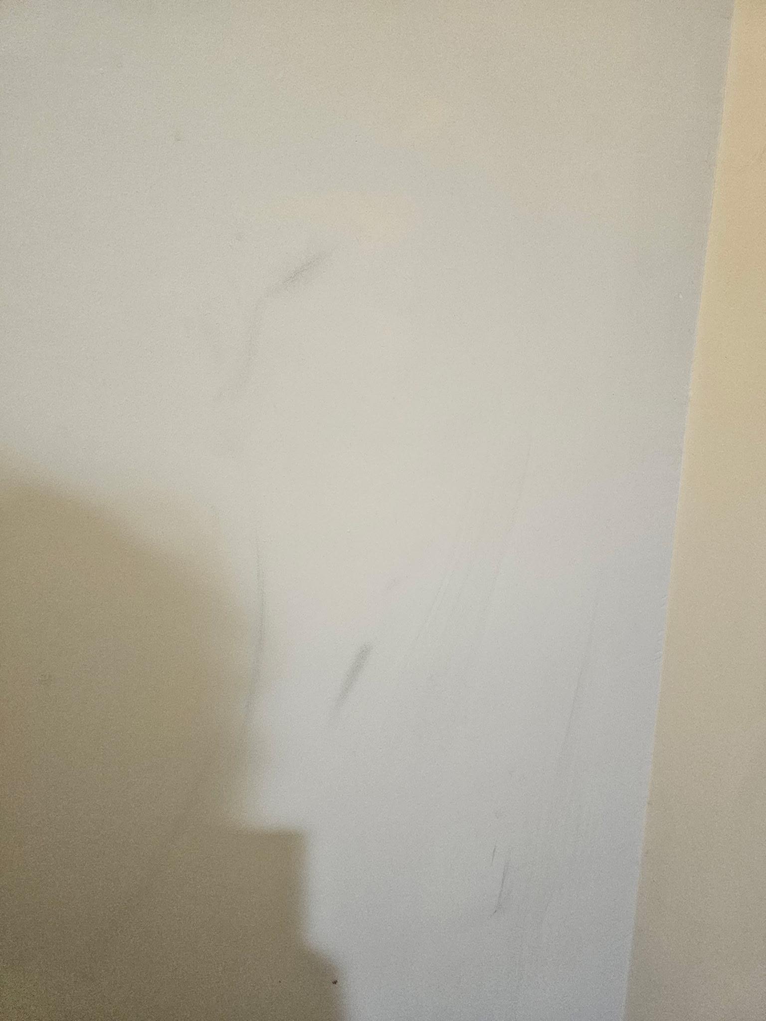 Scuffs like this all over the walls 