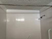No shower curtain!