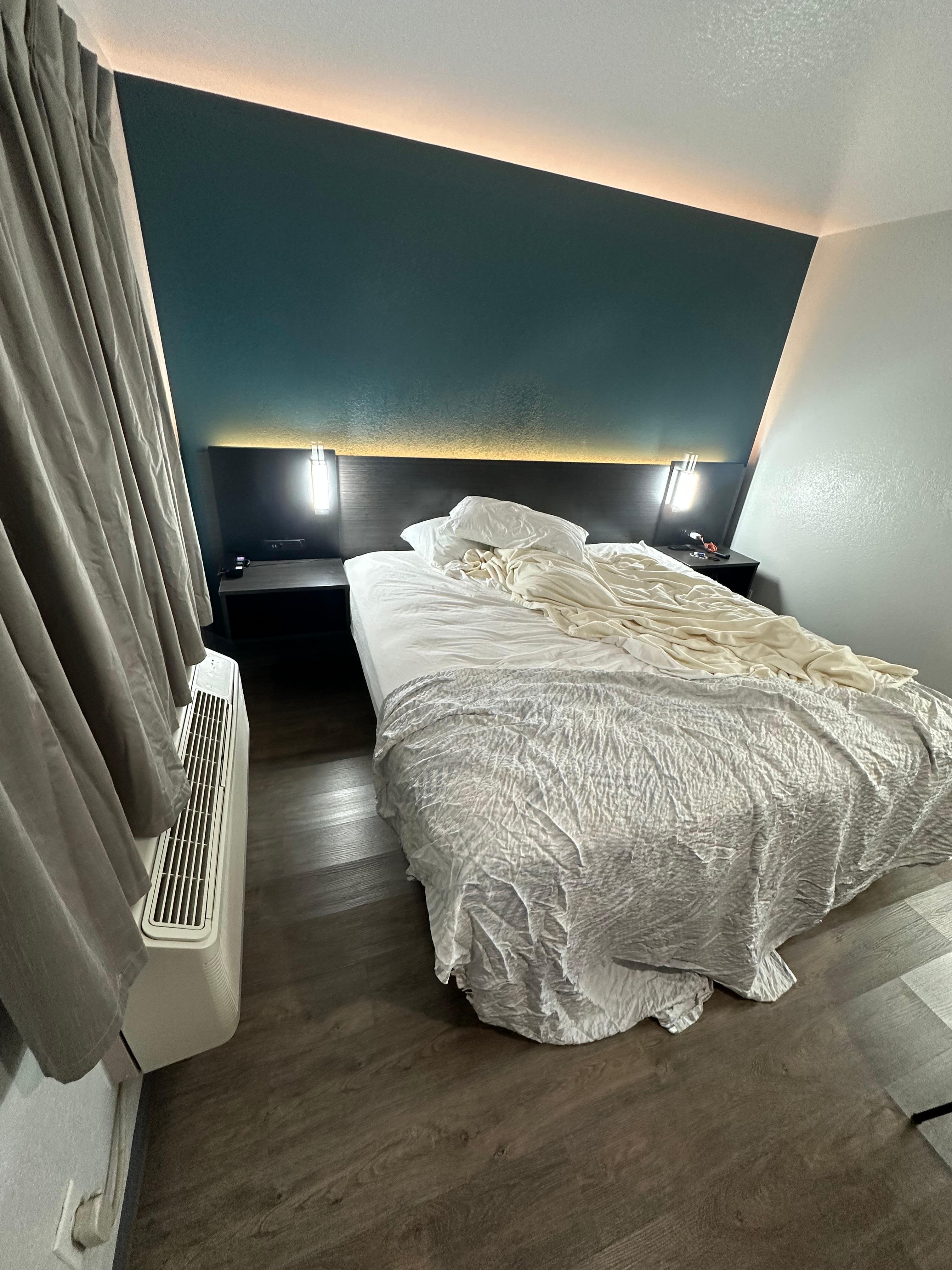 Bedside lighting is VERY bright (though soft back-lit headboard led light is nice!) Pillows and sheets are a little thin, but are comfortable and soft. 