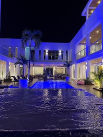 Main pool night view from the spa
