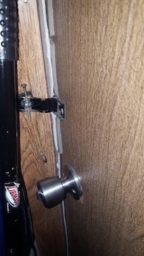 Back door lock… held with a screw