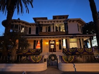 The mansion in the evening .