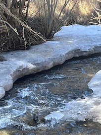 The beautiful river steps away from the house.
