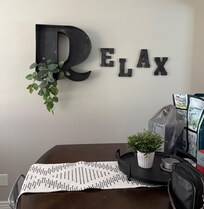 Lots of seating at the dining room table, able to see TV too. Open floor plan