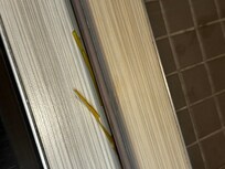 Something coming off the shower door