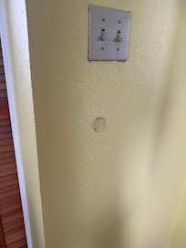 This was one of the many holes left ALL OVER the house.