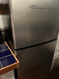 stained drips on refrigerator