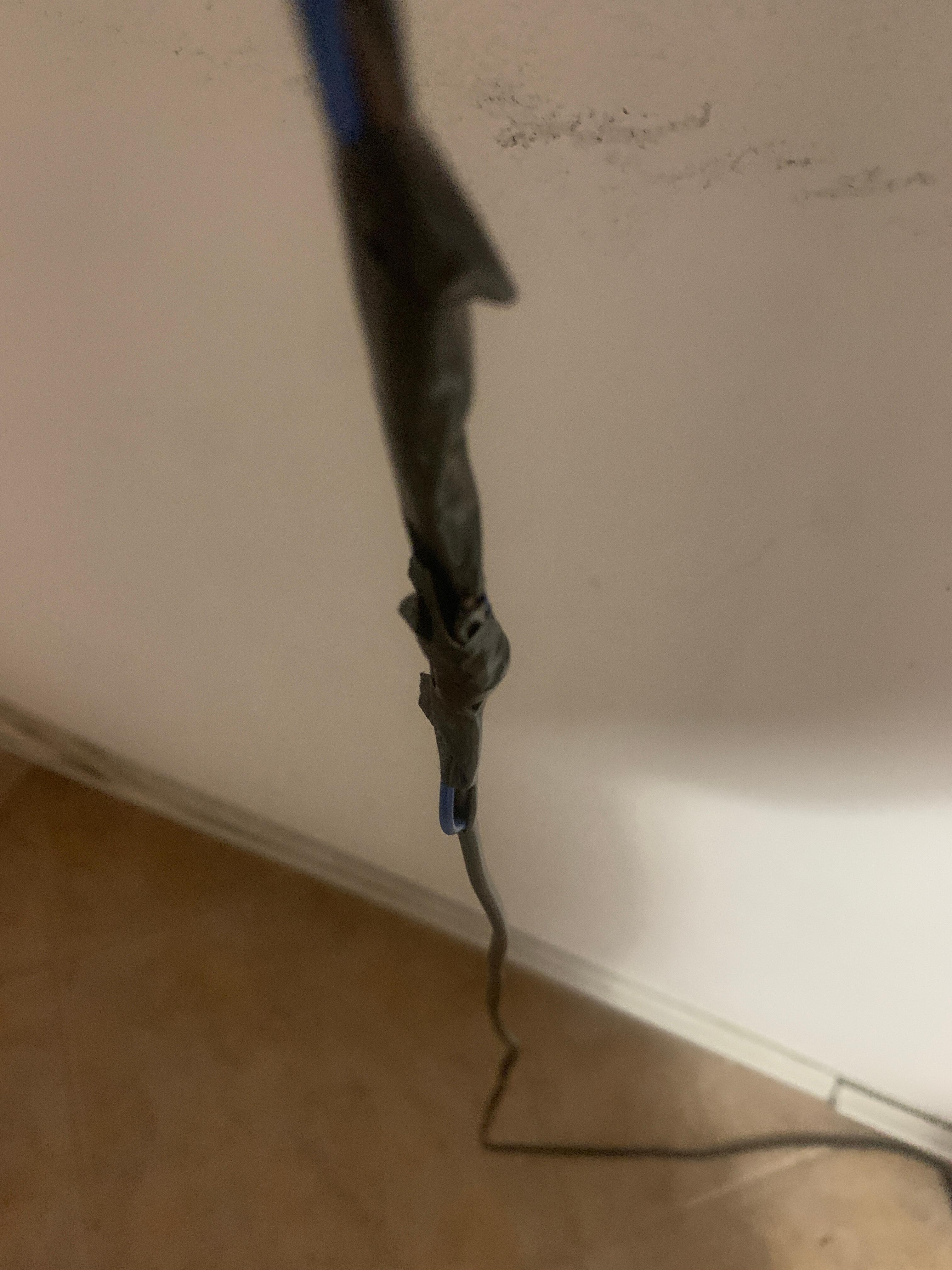 Electrical Tape on the TV cord, a bit scary. 
