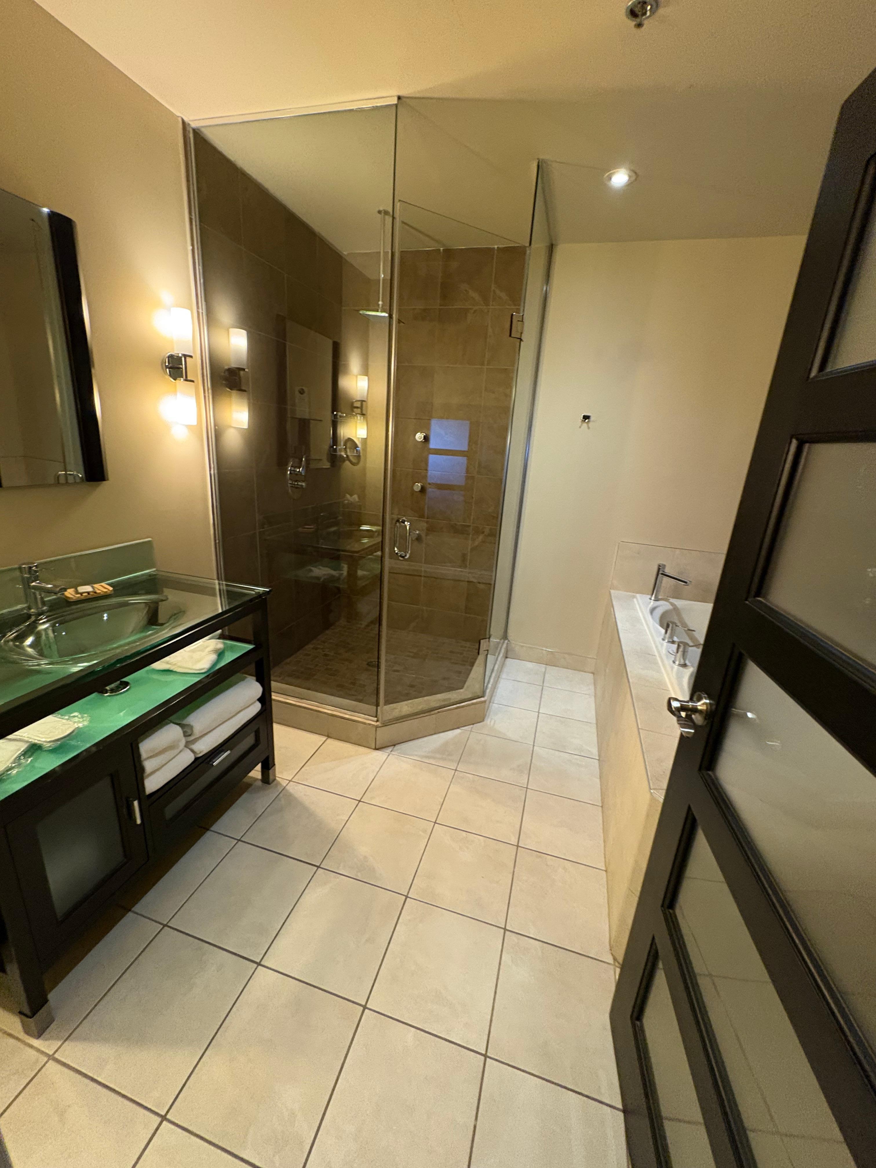 Bathroom - toilet behind door and jacuzzi tub - didn’t disappoint!