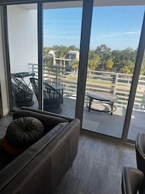 Floor to ceiling doors/windows. Plenty of sunshine.