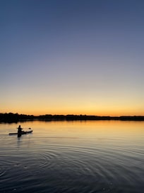 me paddle boarding at sunset