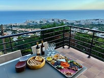 The spectacular view overlooking the sea and the town.