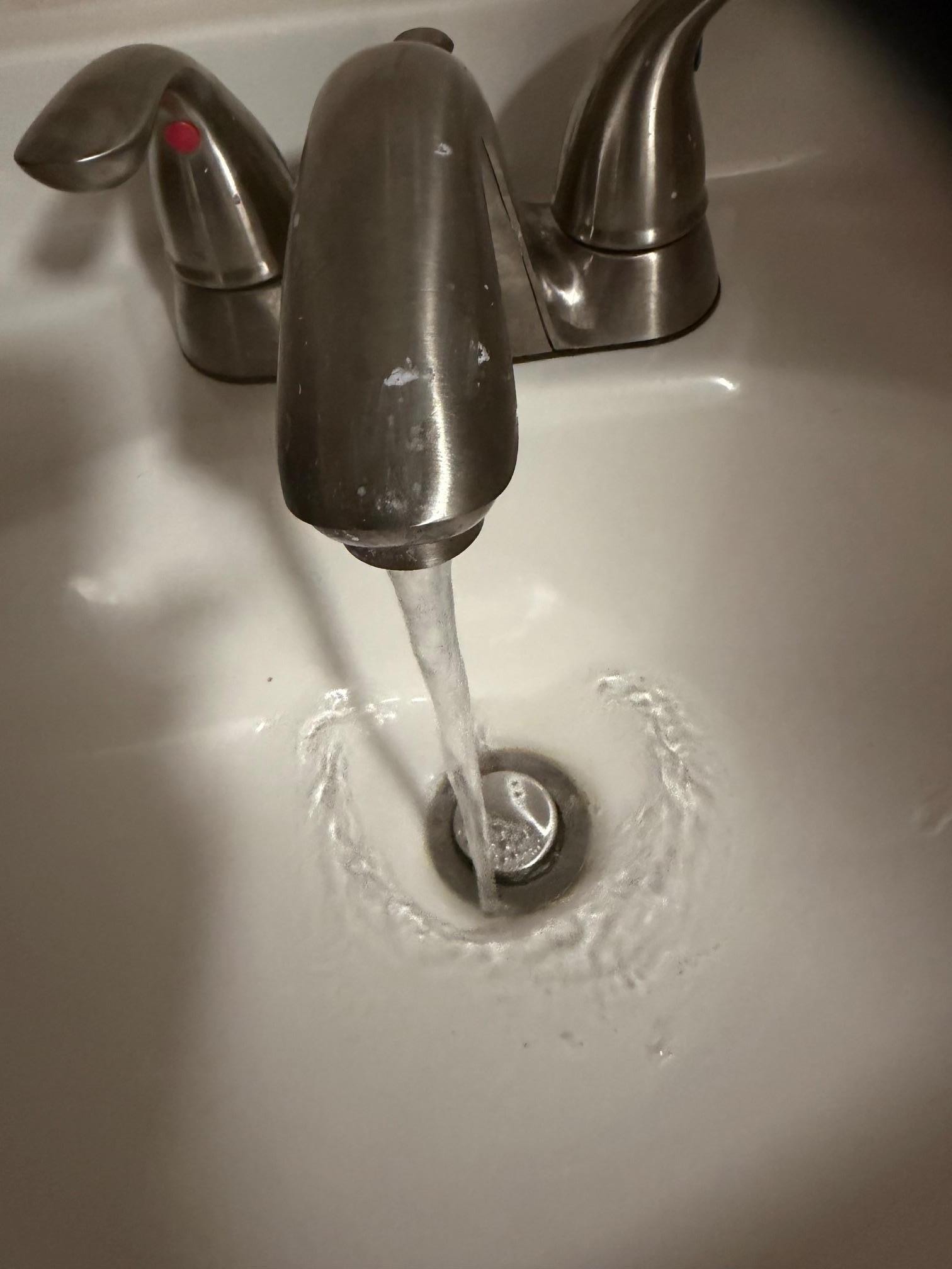 A trickle of luke warm water--impossible to take a shower and wash your hair.