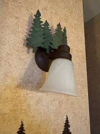 The switch for the desk lamp is right by the door; I can't find it at all.