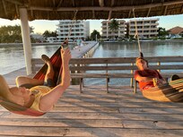 Relaxing on dock hammocks