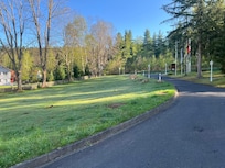 Driveway into hotel with many walking paths