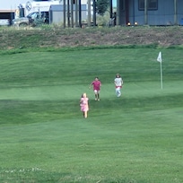 Grandkids playing on the greens