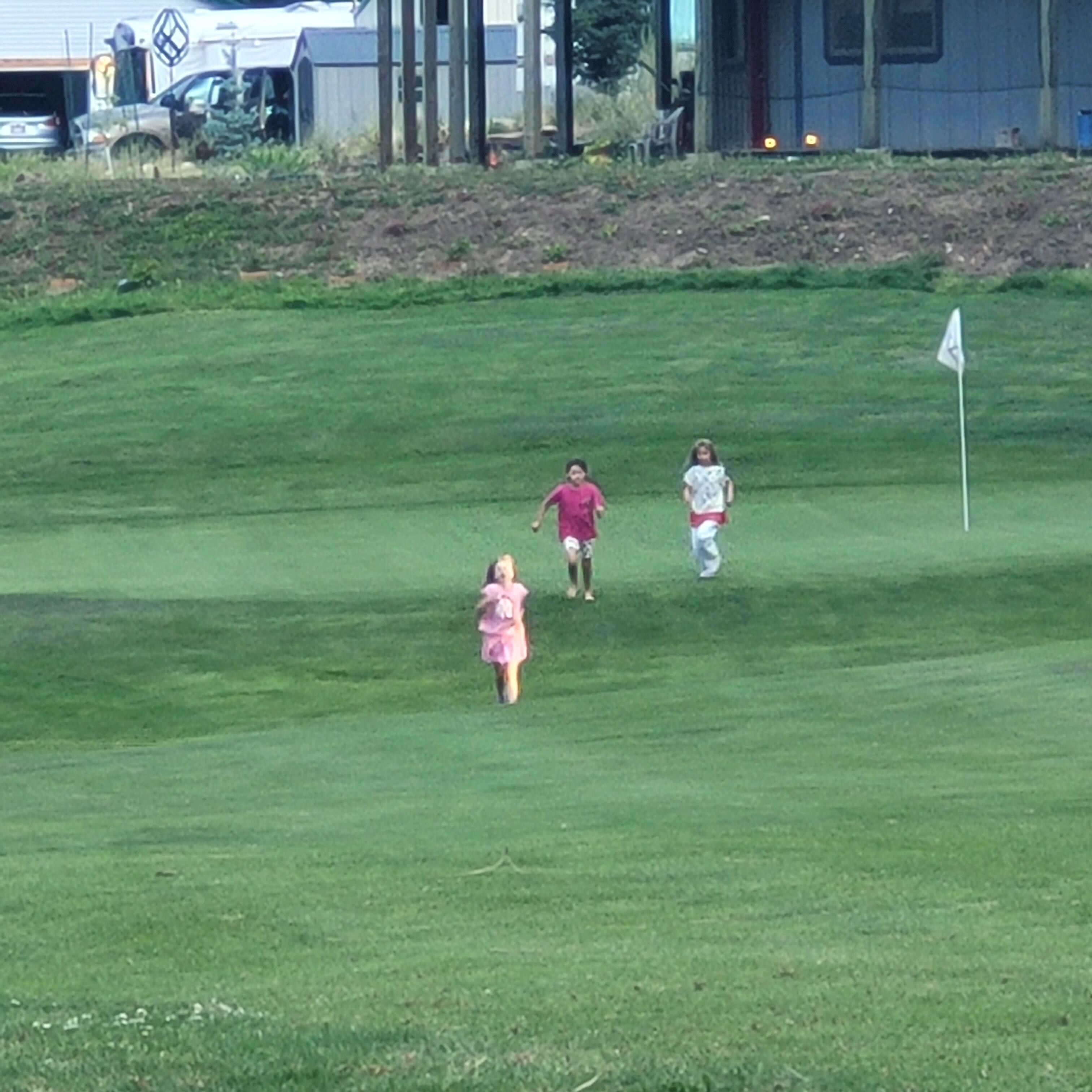 Grandkids playing on the greens