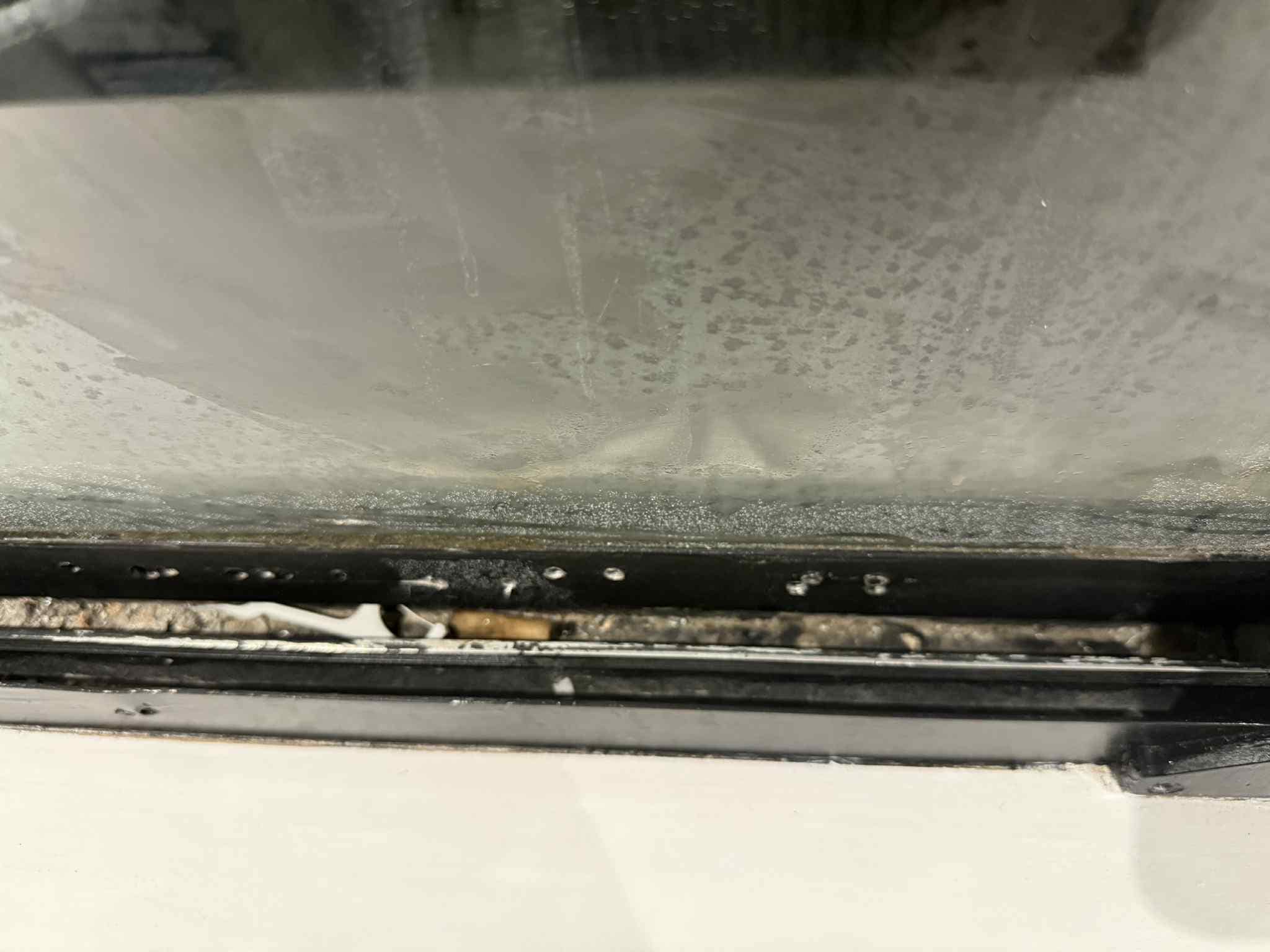 Cigarette ends in the window frame