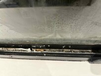 Cigarette ends in the window frame