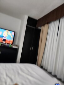 Windows view as you can see no room to walk on the other side of the bed.