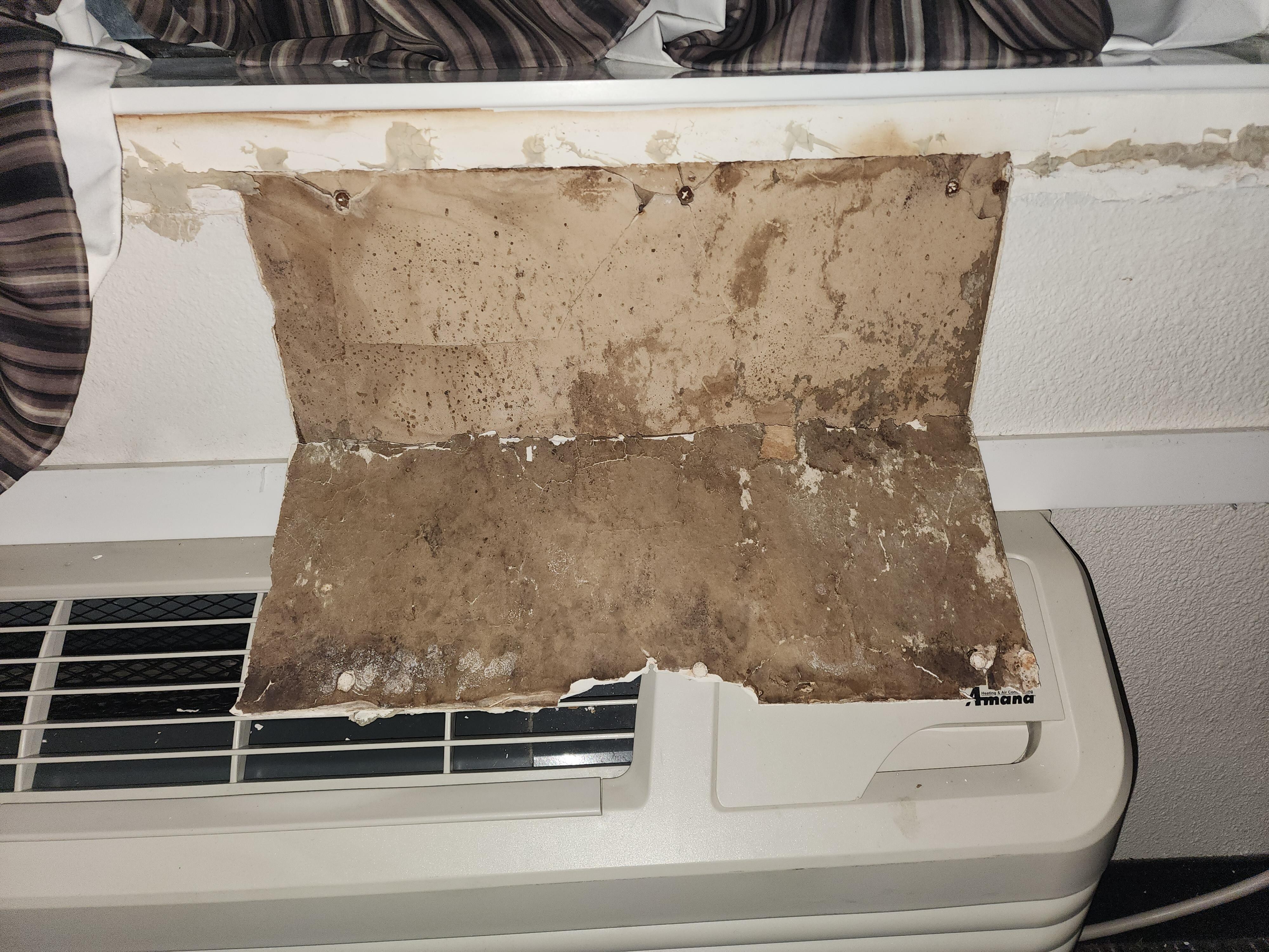 Loose drywall near air conditioning unit 