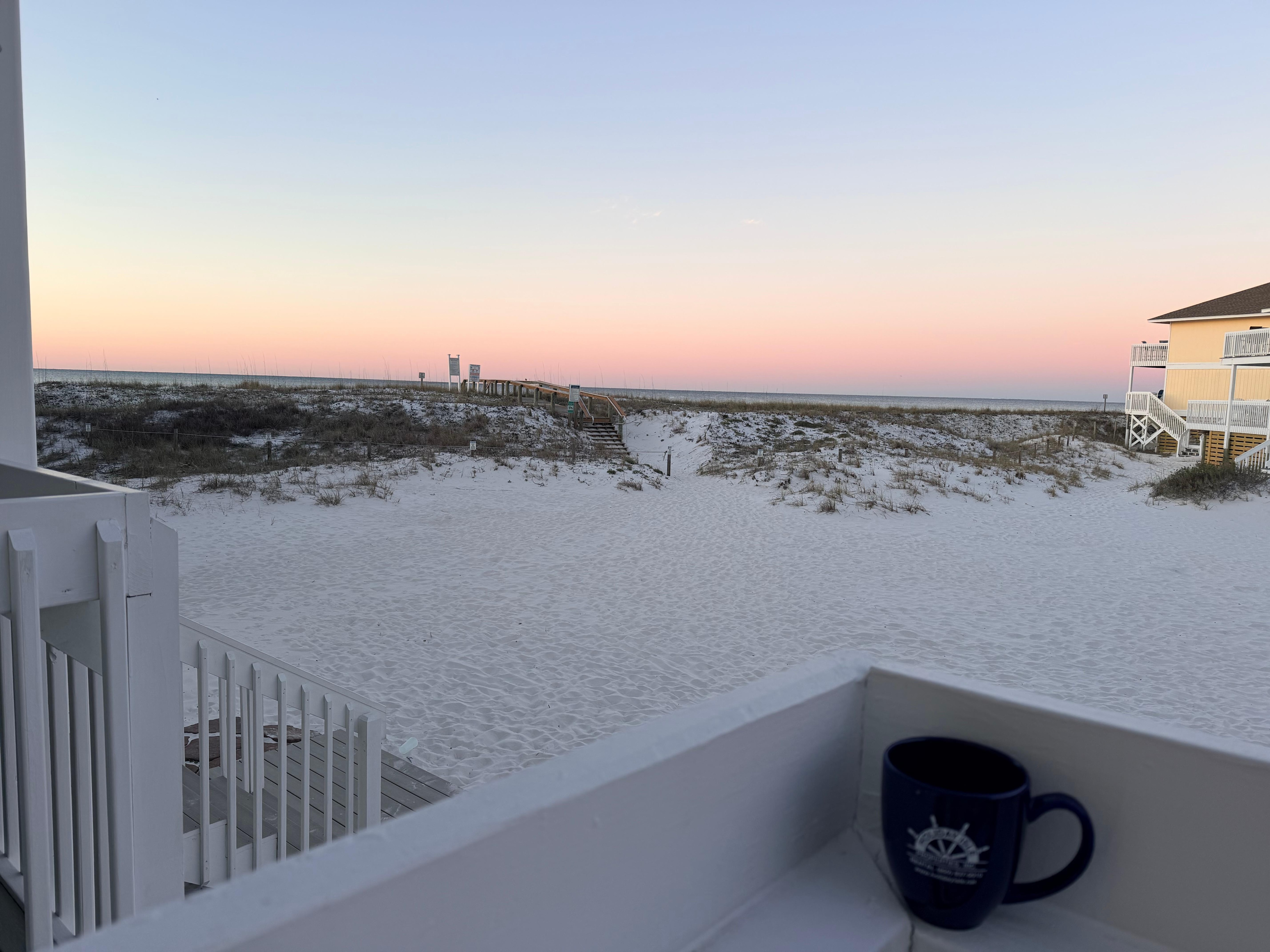 Ocean is right over the dunes, can be heard from the deck.