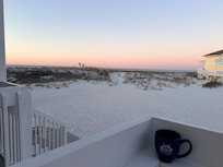 Ocean is right over the dunes, can be heard from the deck.