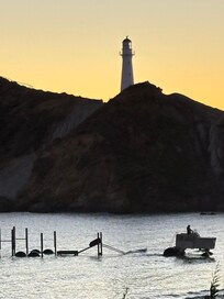 Sunrise fishermen off
