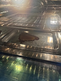 Sticky residue in oven upon arrival which created a bunch of smoke