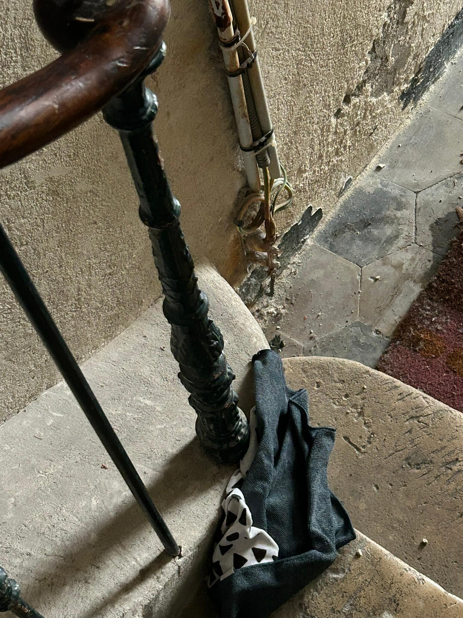 Dirty rags on stairs when we arrived