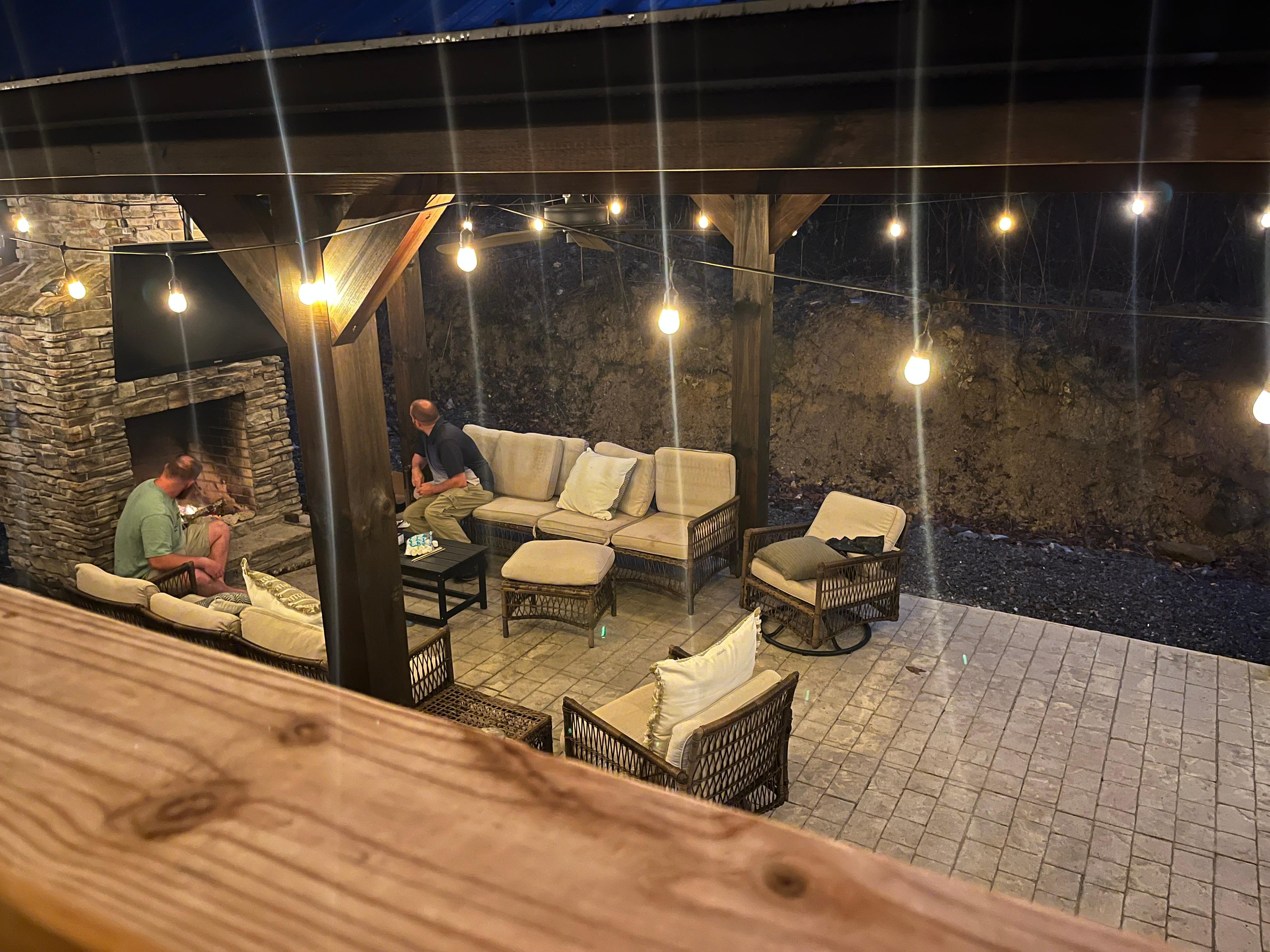 Enjoying the beautiful pavilion and fireplace!